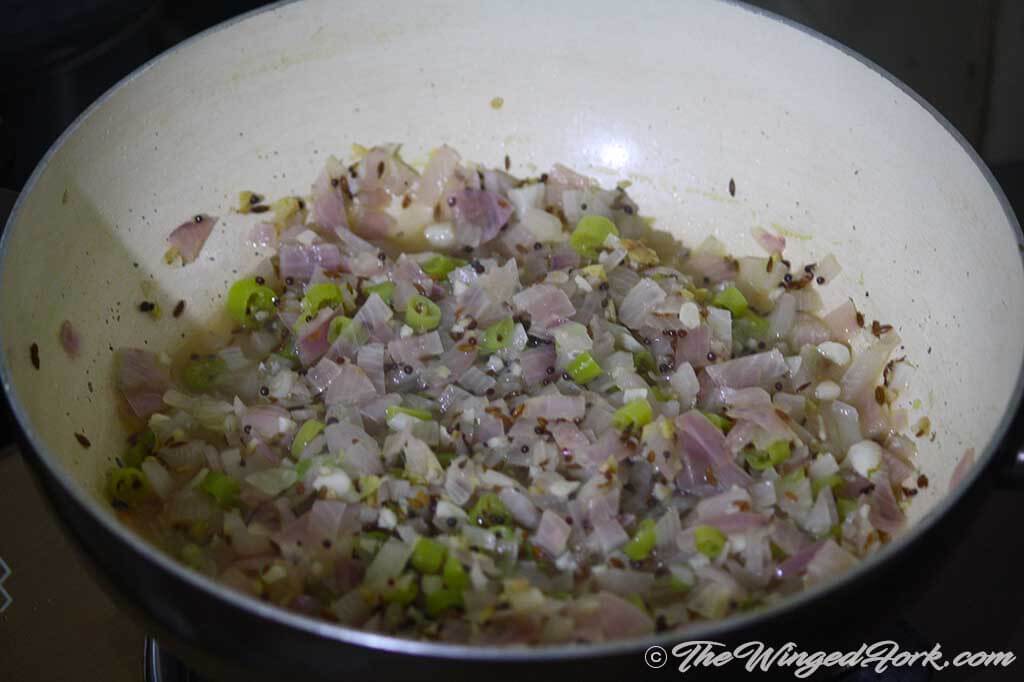 Fry the onions, chillies, ginger, garlic, mustard and cumin till the onions are translucent - Pic by Abby from AbbysPlate