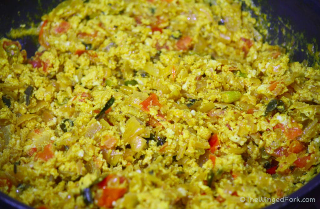 Turn off the flame and keep mixing the egg bhurjee aka scrambled egg for another minute