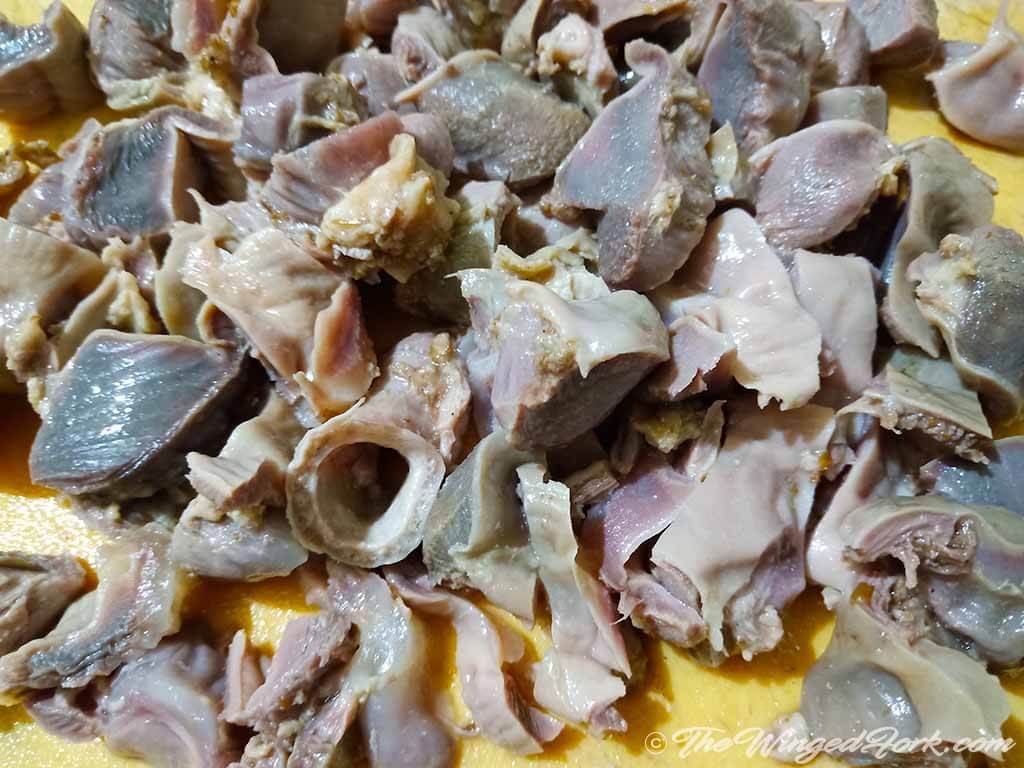 Closer look at diced pieces of chicken stomach.