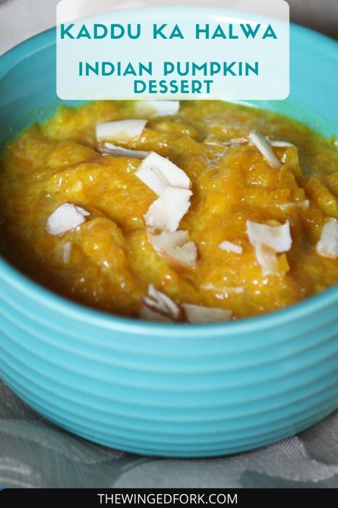 Pinterest Image of Pumpkin Halwa in a blue bowl with sliced almonds.