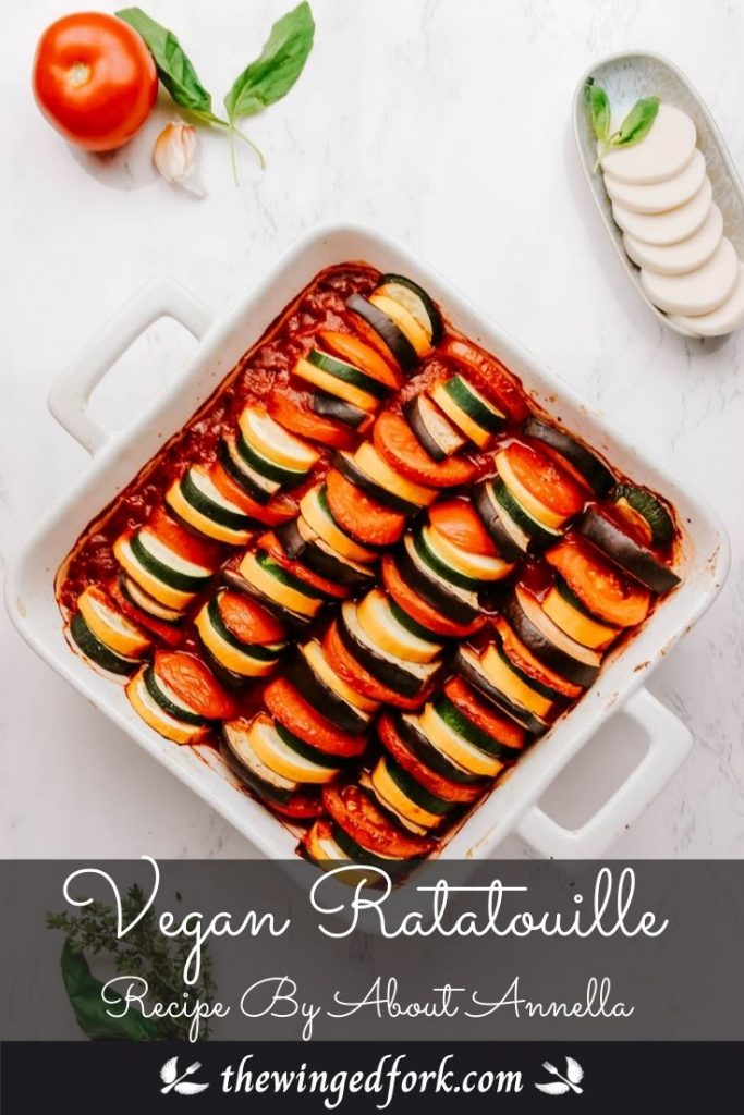 Pinterest image of a white baking dish with vegan ratatouille.