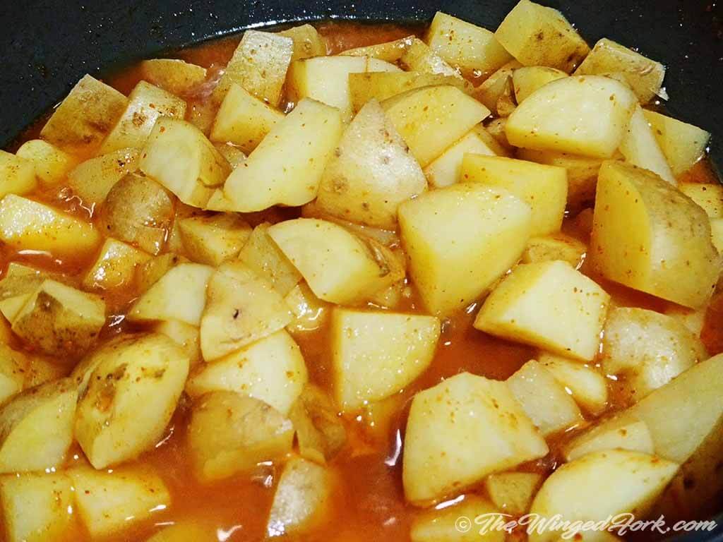 Add water and let the potato cook.