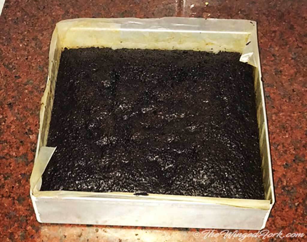 Brownie is baked in square tray.
