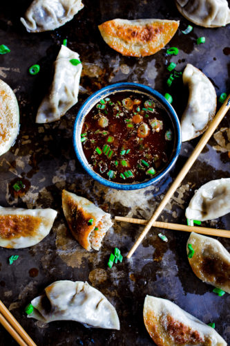 Mushroom Dumplings with spicy black garlic soy sauce.