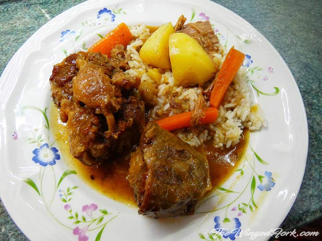 Tasty South African Oxtail Stew is served.