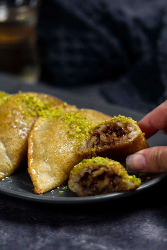 Stuffed pancakes filled with walnuts and coated with