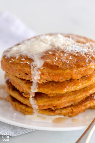 Keto Carrot cake pancakes drizzled with butter.