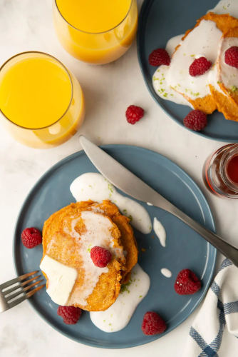 Sweet potato pancakes with coconut whipped cream.