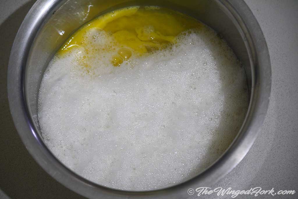 Mix beaten egg yolks and whites.