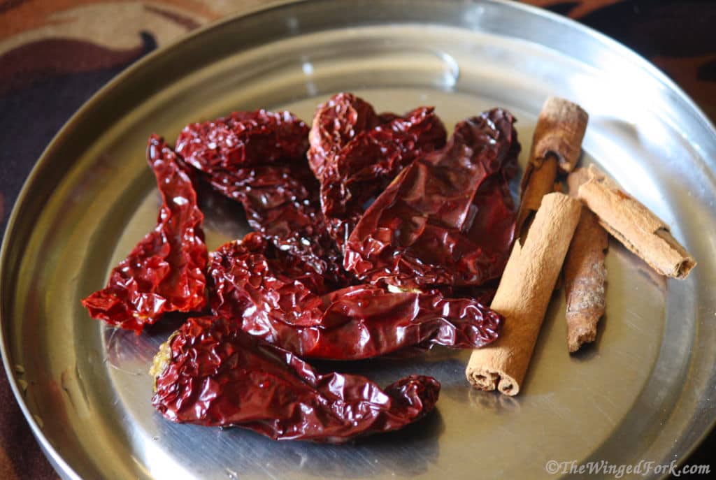 Dried red chillies and cinnamon sticks.