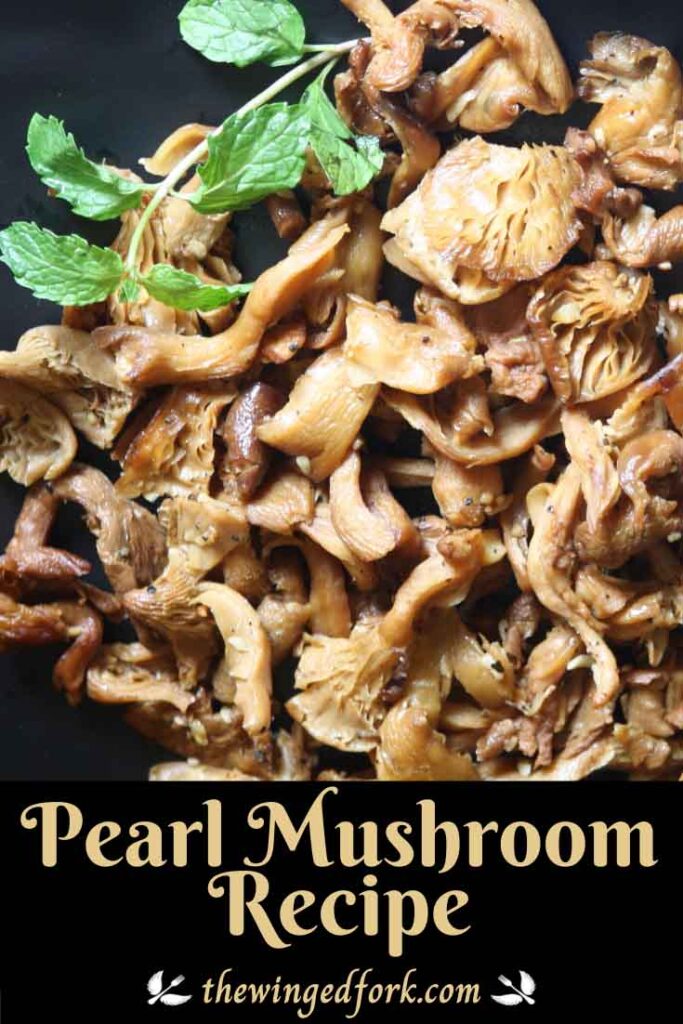 Pinterest images of oyster mushrooms sautéed in garlic butter served on black plate.