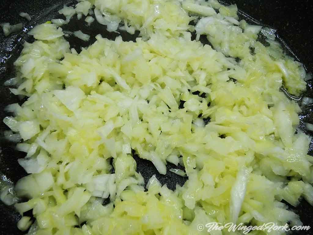 Let the onion cook in butter till it turns transparent.