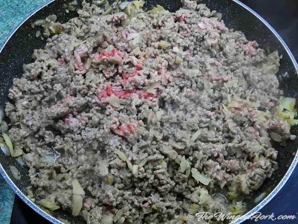 Add mince to the fry pan and let it cook.