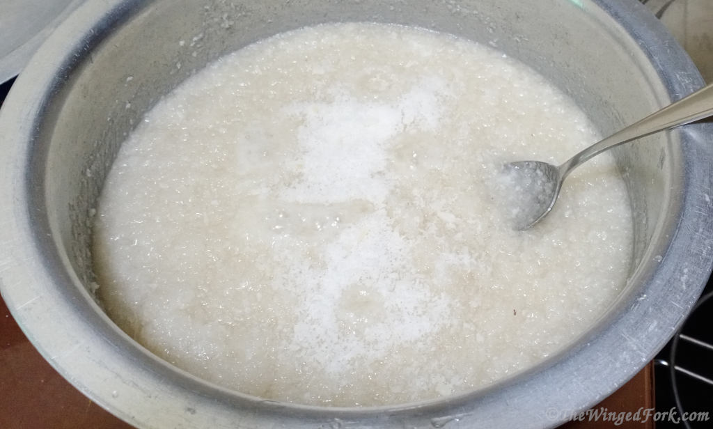 Desiccated coconut added to the sugarmel