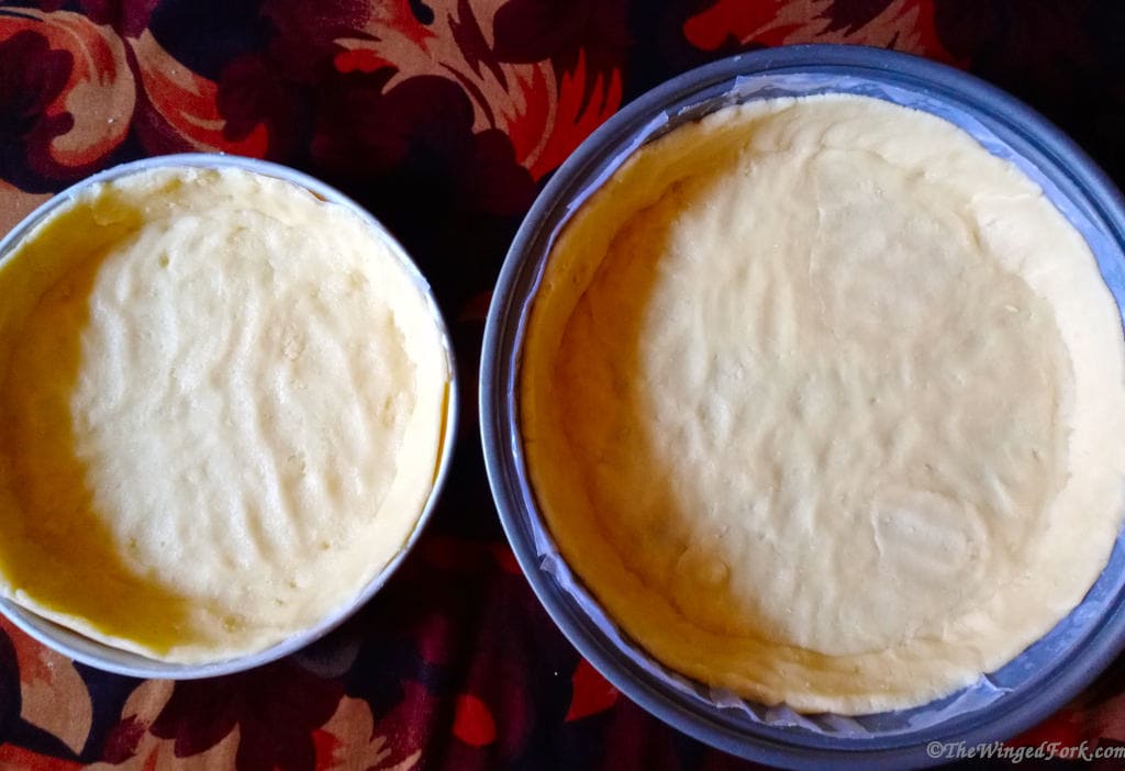 Pastry dough filled into the tins.