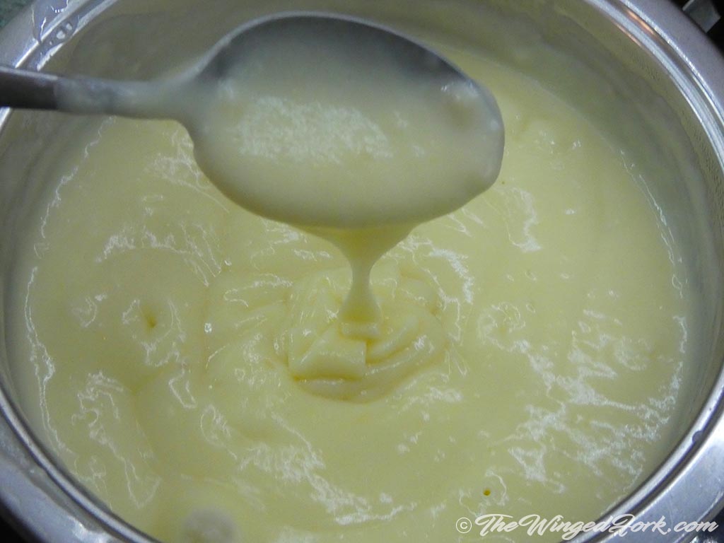 Cook the egg yolk and milk mixture till it gets dense.