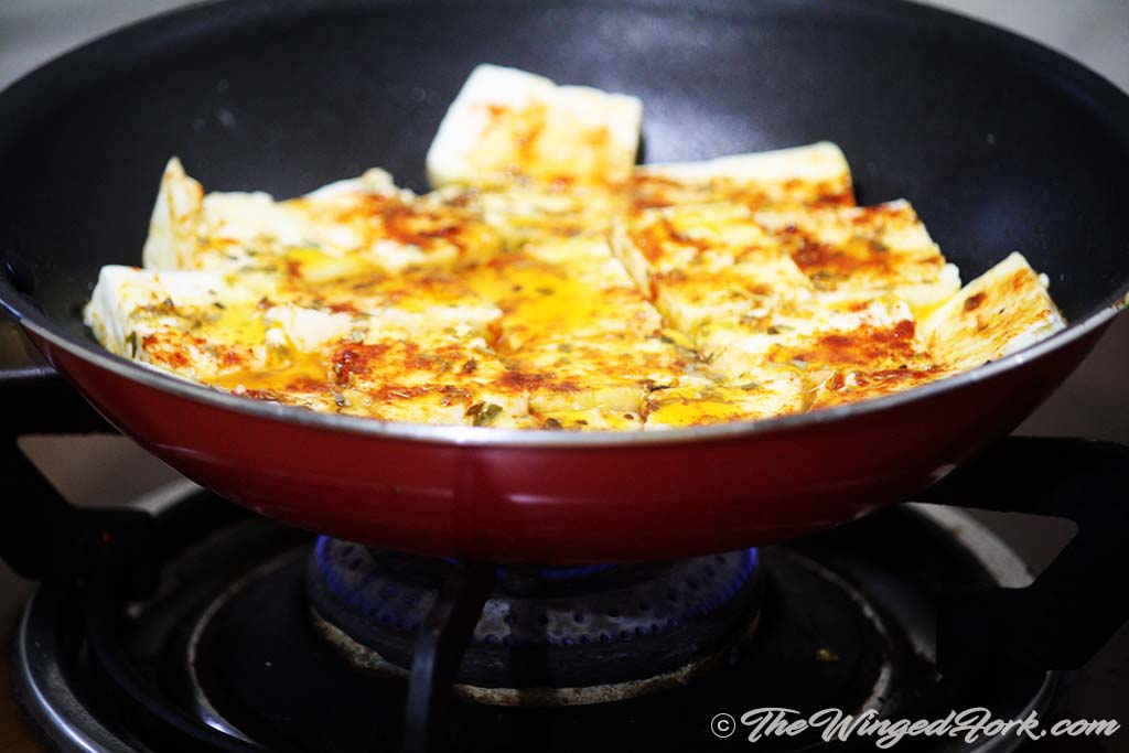 Fry the masala paneer in a pan on low flame.
