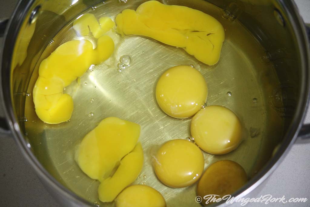 In a deep vessel remove egg yolk and white.