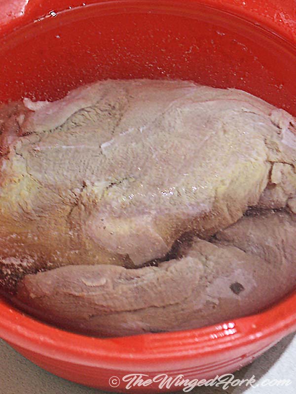Wash ox tongue in water.