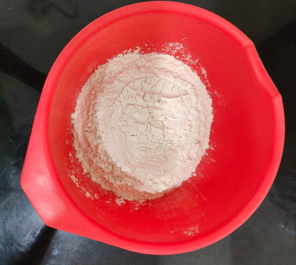 Flour in a red bowl.
