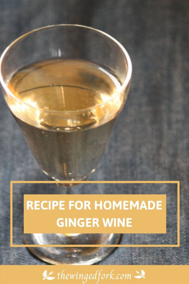 Homemade ginger wine in a wine glass.