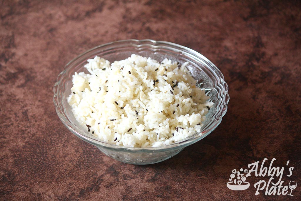 Glass bowl of Indian cumin rice.