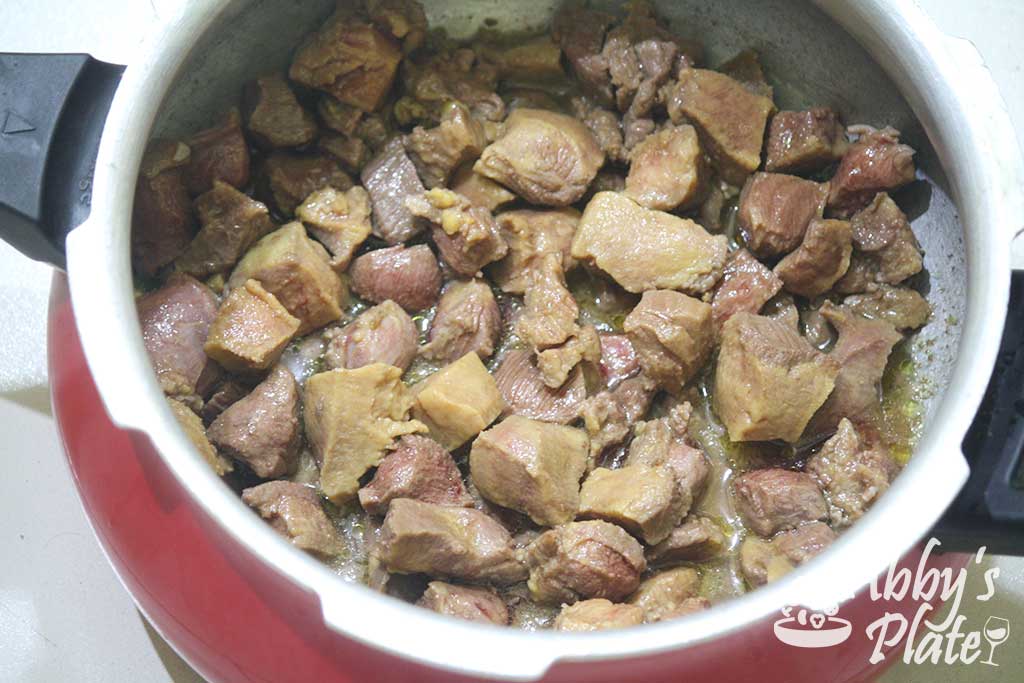 Cooked beef tongue cubes.